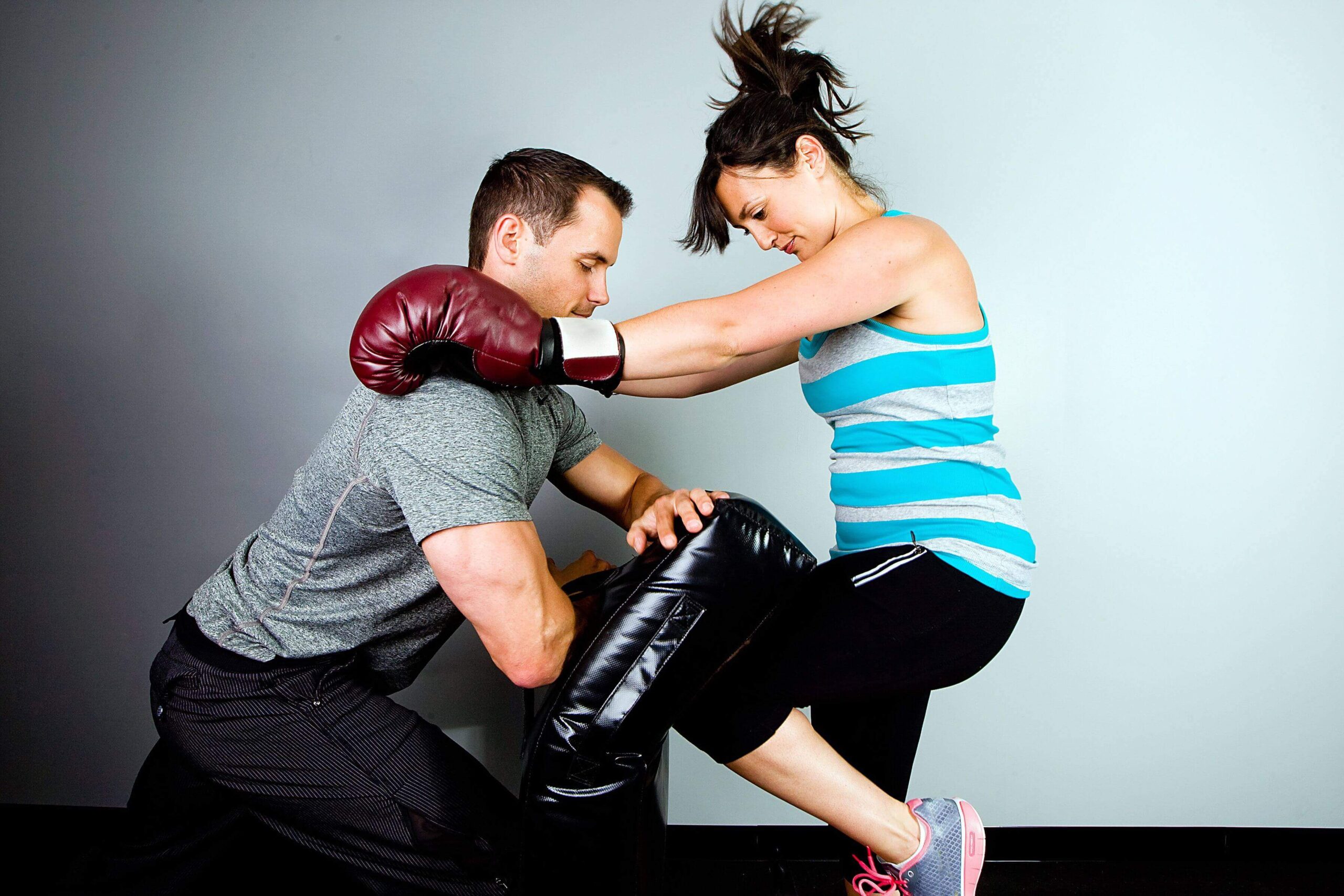 women self defense class knee strike